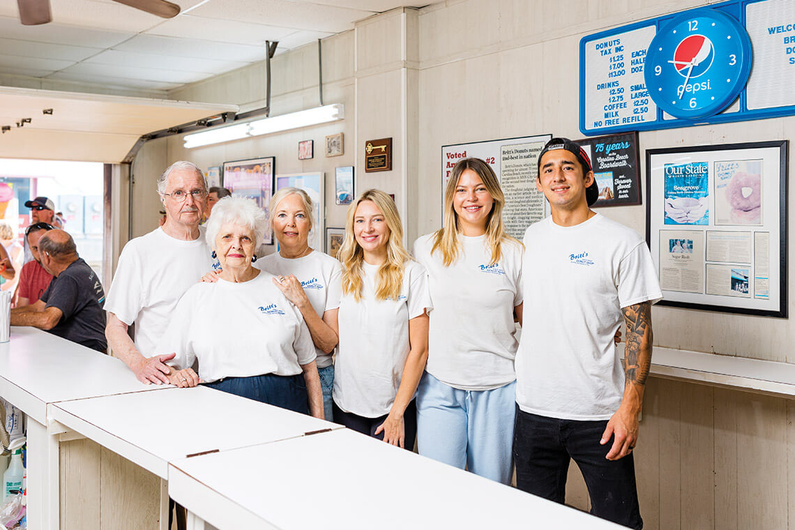 Bobbt and Maxine Nivens with their daughter and granddaughters behind the counter at Britt's