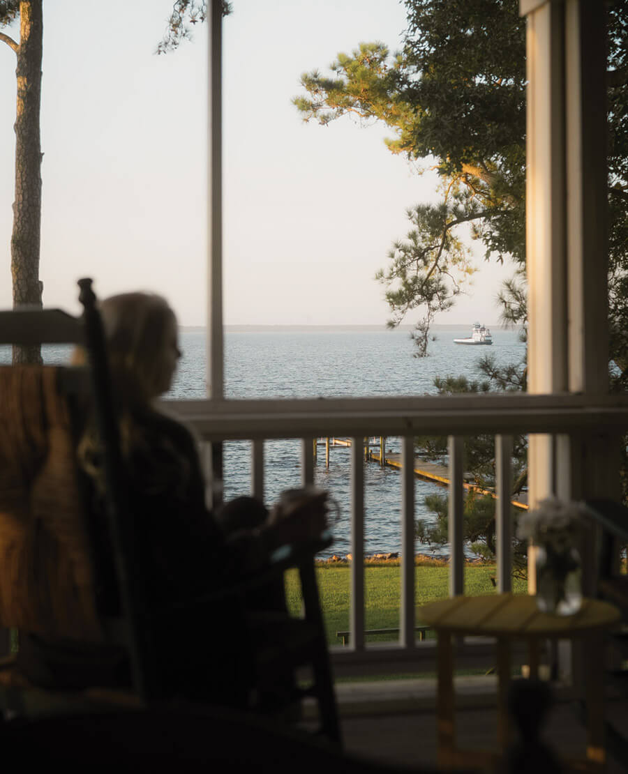 The author on her porch in Rest Haven, watching the ferries come and go.