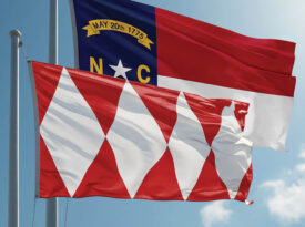 The Granville County flag flies beside the North Carolina flag.