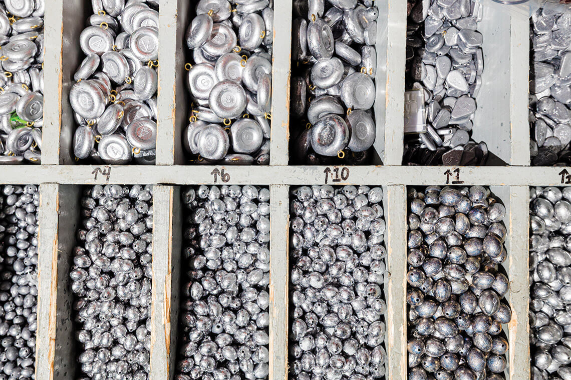 Containers of sinkers and fishing weights