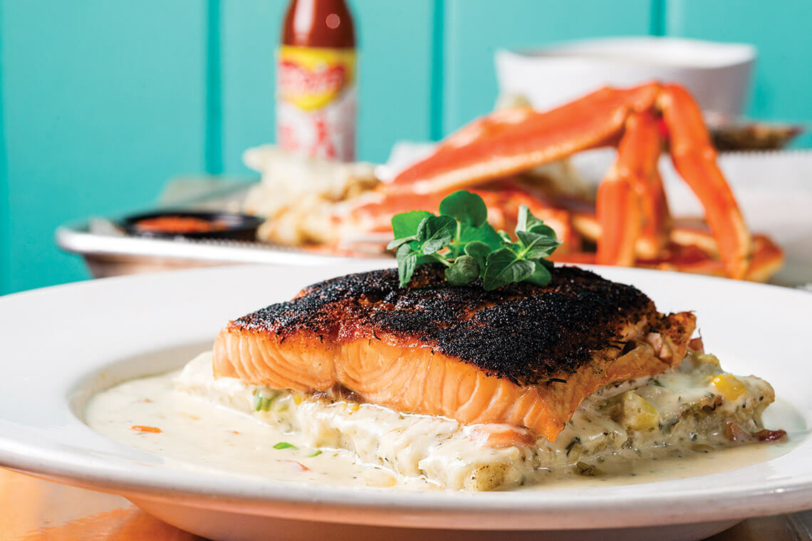Blackened salmon over grits at Michael's Seafood