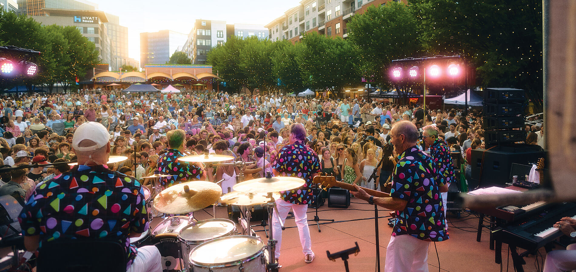 The Embers performing in front of a crowd in Raleigh
