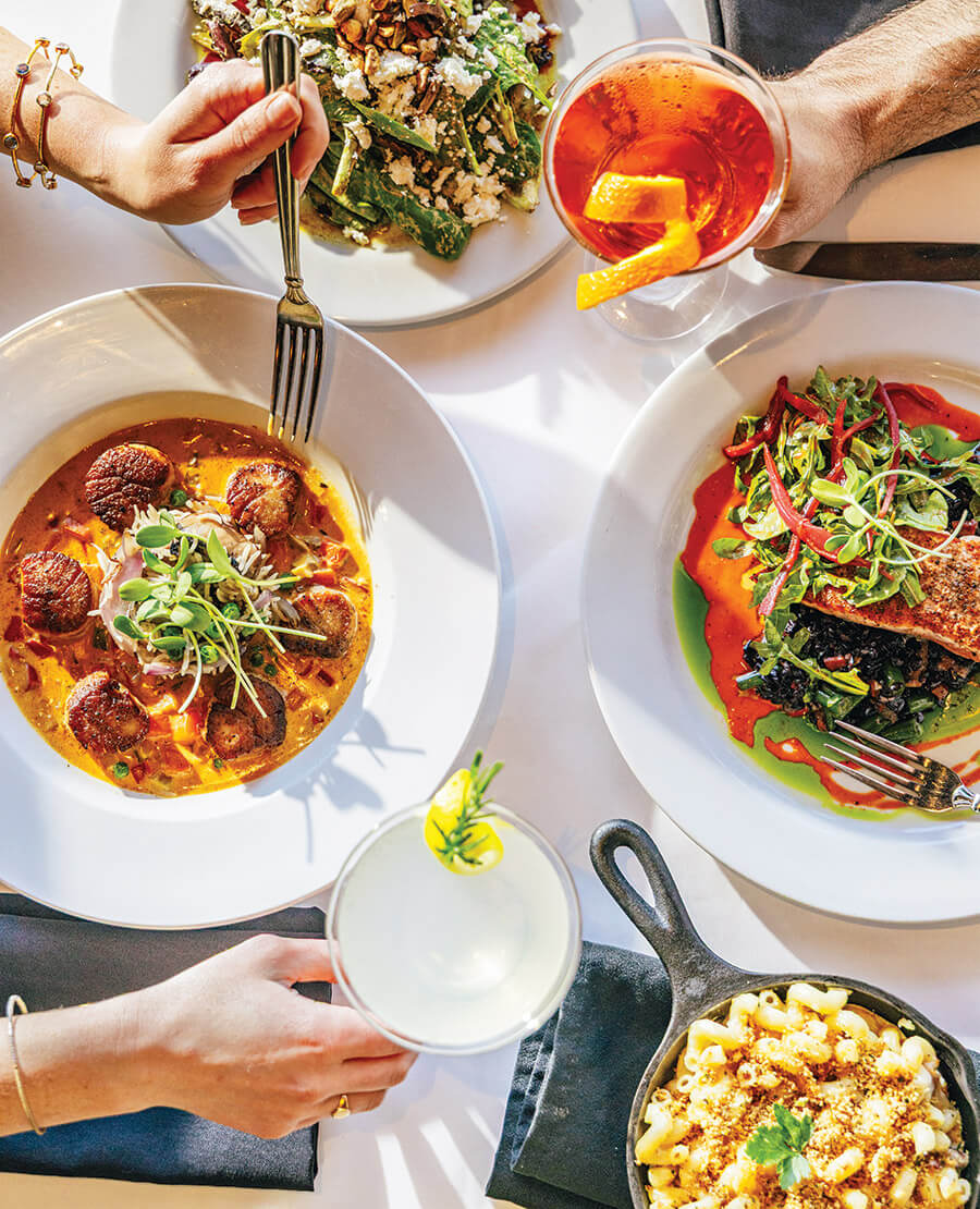 Scallops, salad, mac and cheese, and fish at Ocean Boulevard. 