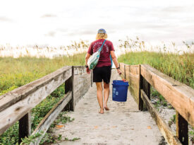 Busovne walks on to the beach for sea turtle patrol