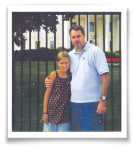 The writer at the age of 10 pictured with her dad