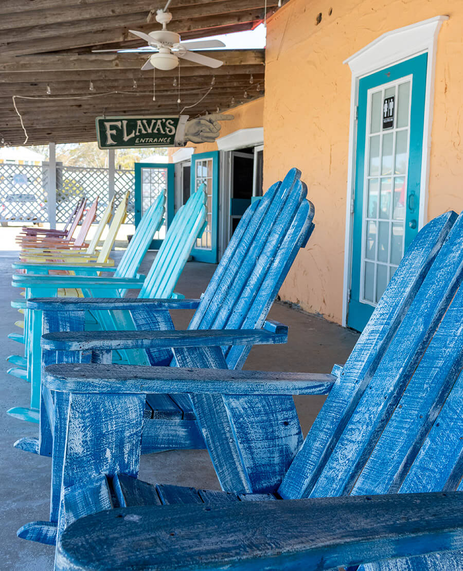 Painted rocking chairs outside of Flava's
