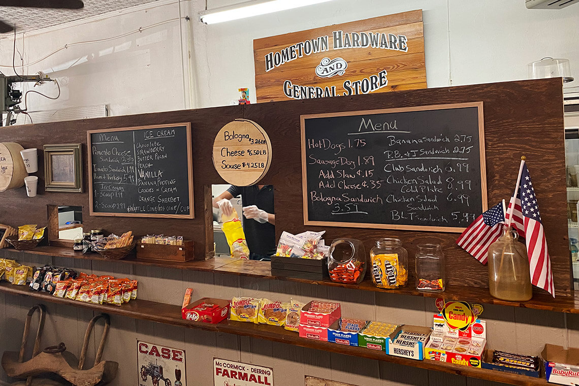 Lunch counter and chalkboard menus at Hometown Hardware and General Store