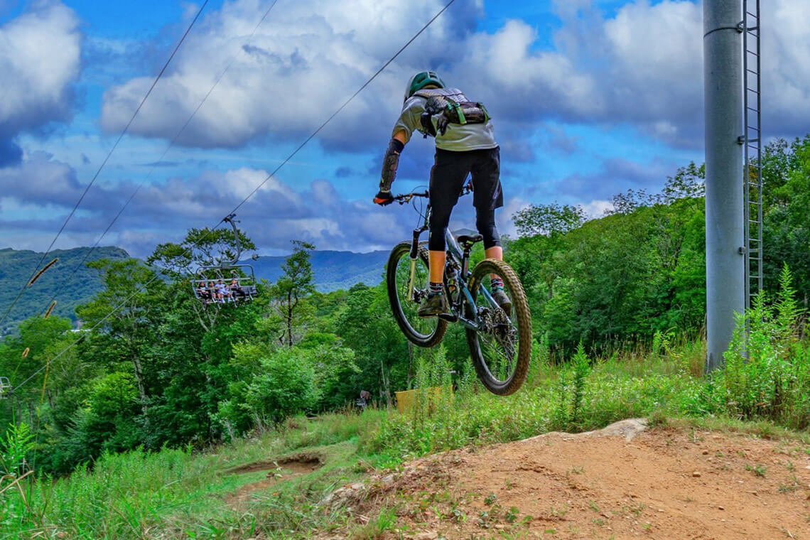 Mountain biker at the Downhill Mountain Bike Park at Sugar Mountain
