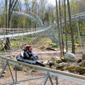 Couple rides the Wilderness Run Alpine Coaster