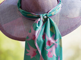 A lavender hat on display