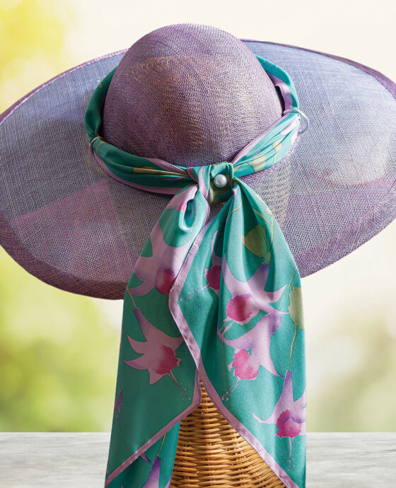 A lavender hat on display