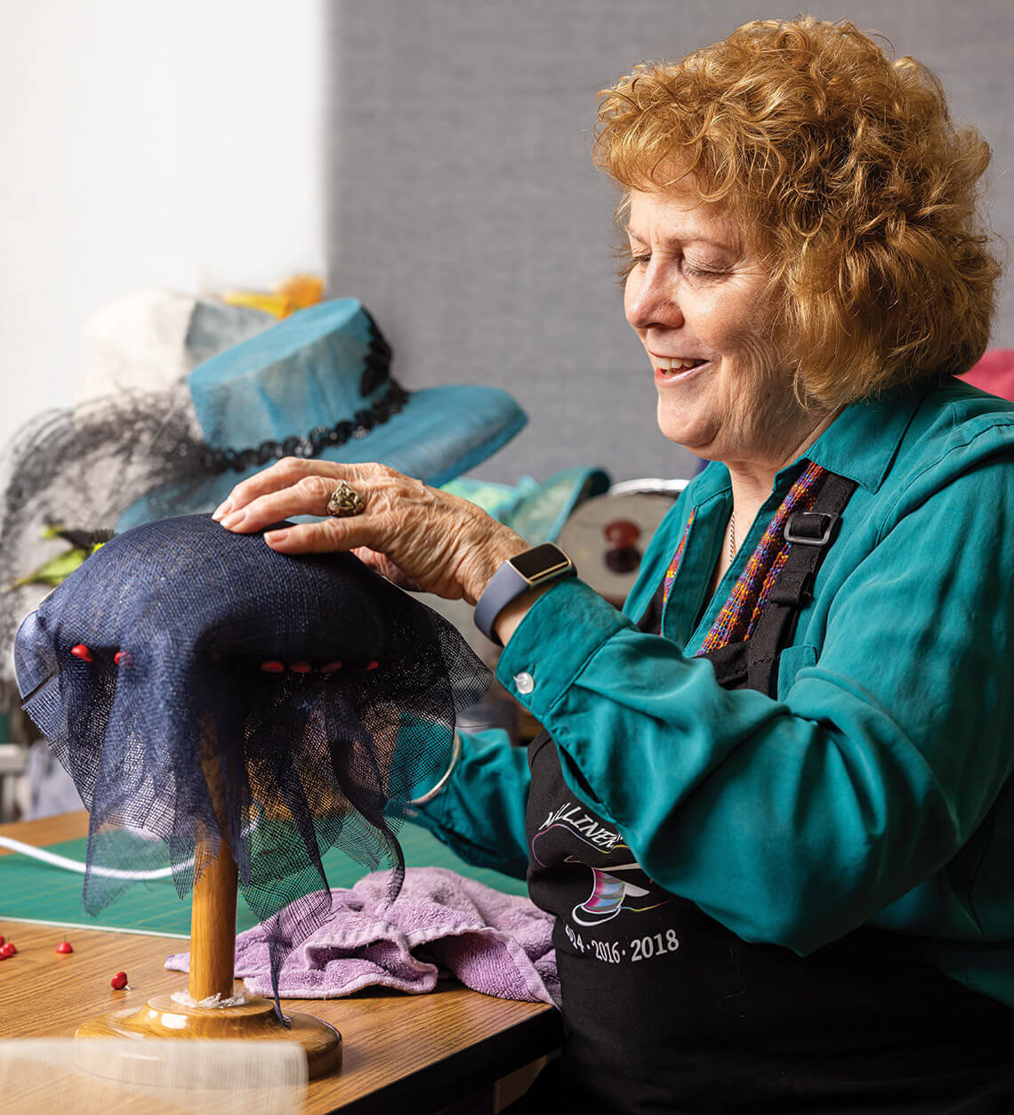 Teresa Bouchonnet making a hat