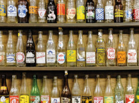 Shelves of vintage glass bottles