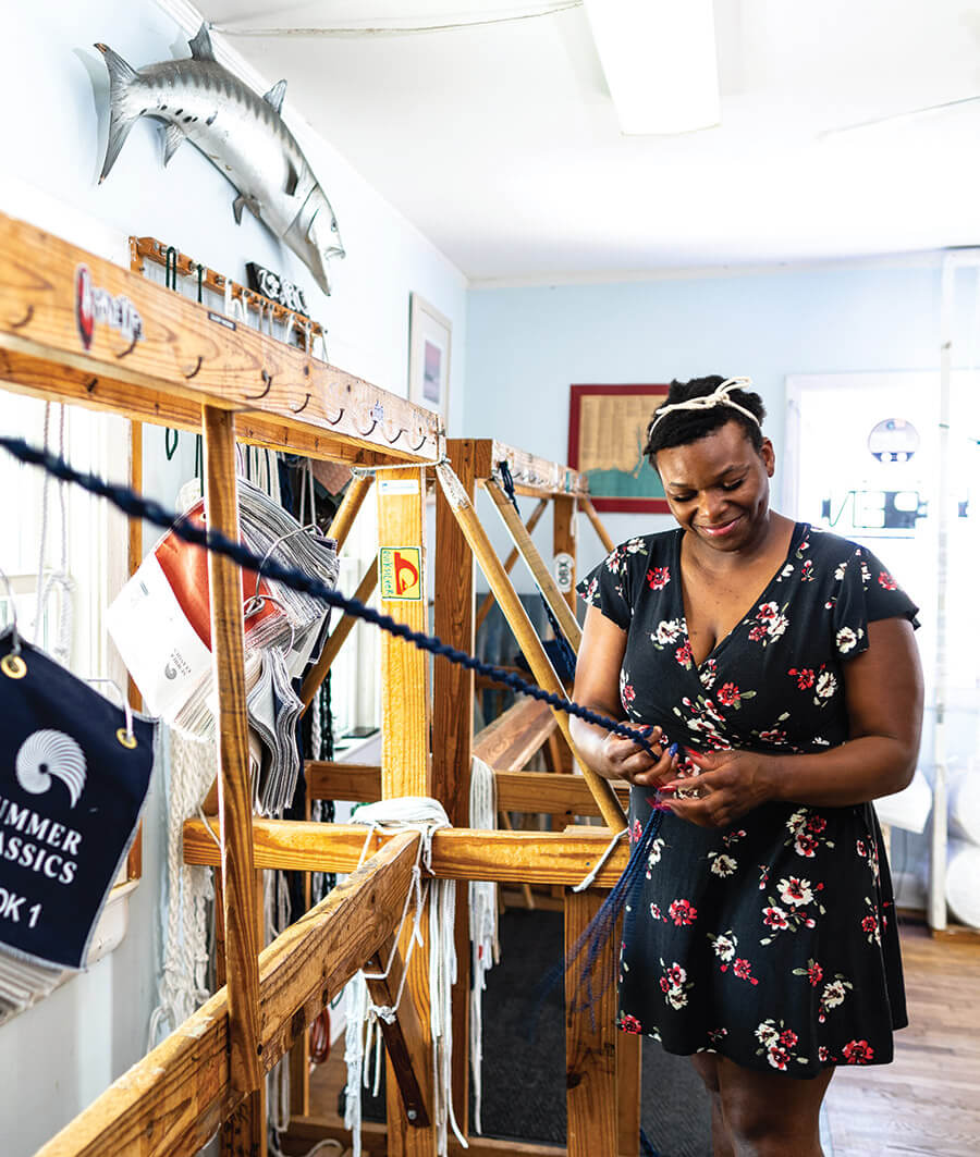 Jasmine Beck weaves a hammock at Outer Banks Hammocks