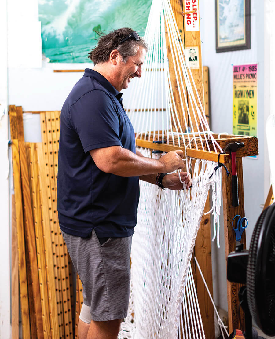 Jonathan Allen weaving a hammock at Outer Banks Hammocks on Wrightsville Beach