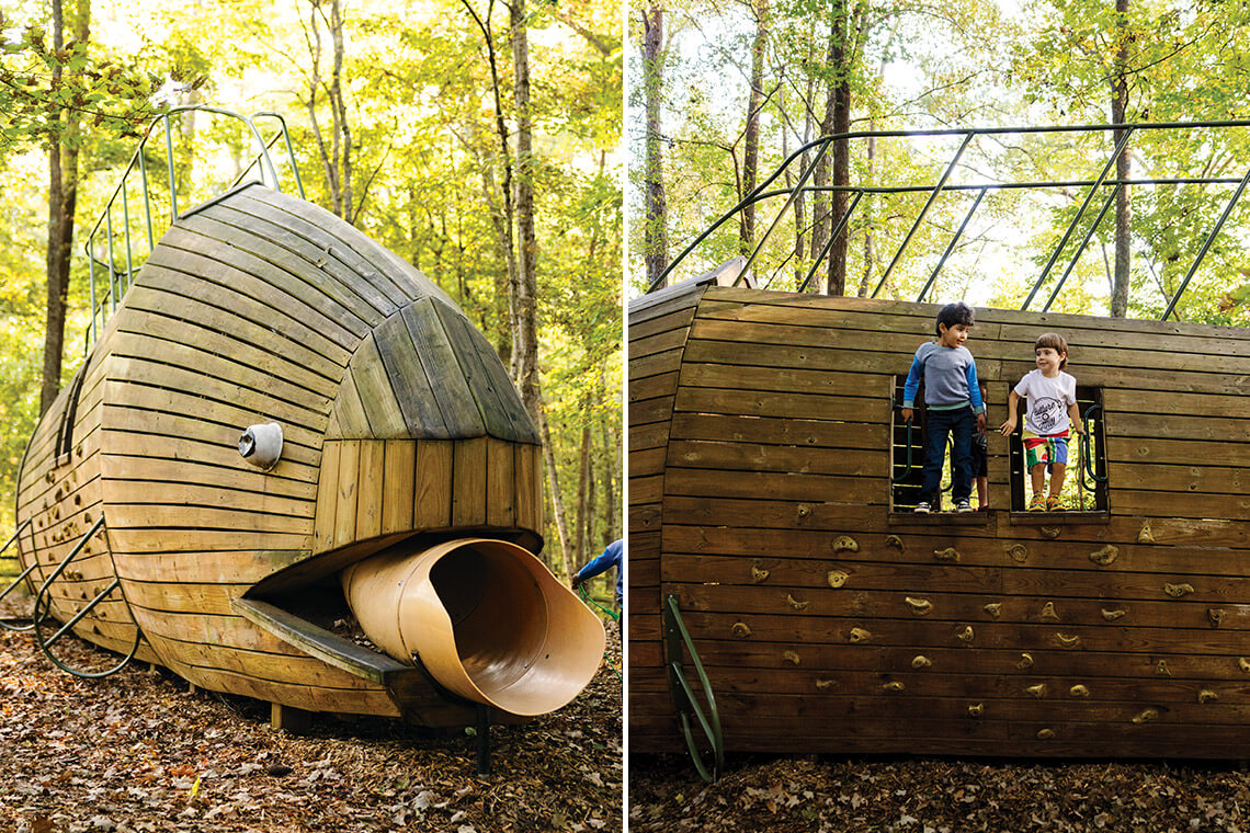 Giant wooden fish and children playing at Saxapahaw Island Park.