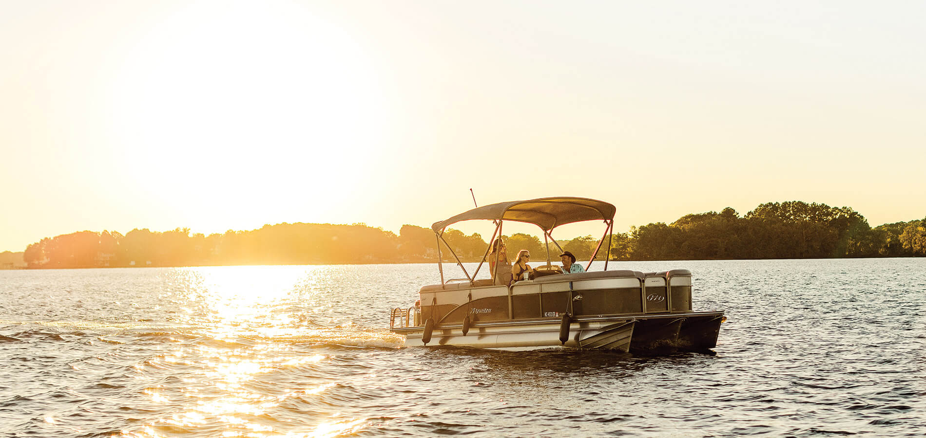 Boat on Lake Norman at sunset