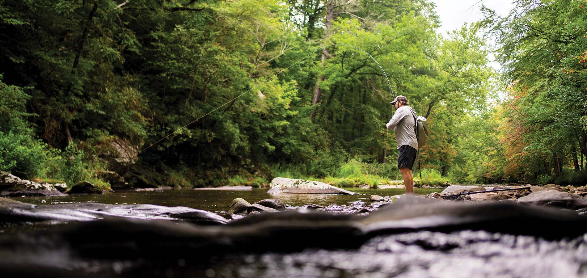 Dustin Coffey fly-fishing in the Watauga River