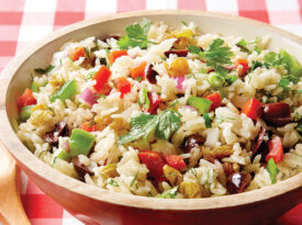 Rice and vegetable salad in a serving bowl