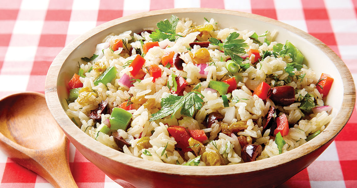 Rice and vegetable salad in a serving bowl