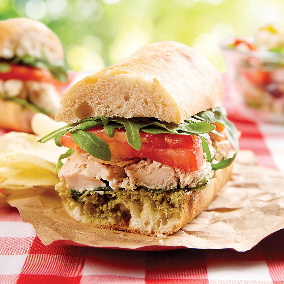 Roasted chicken, tomato, and pesto sandwiches