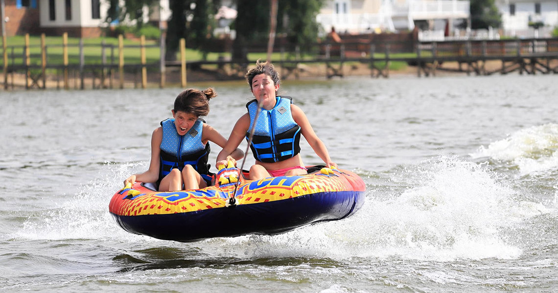 People on innertube at High Rock Lake in Lexington