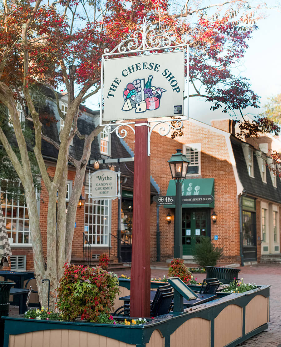Outdoor sign for The Cheese Shop in Williamsburg