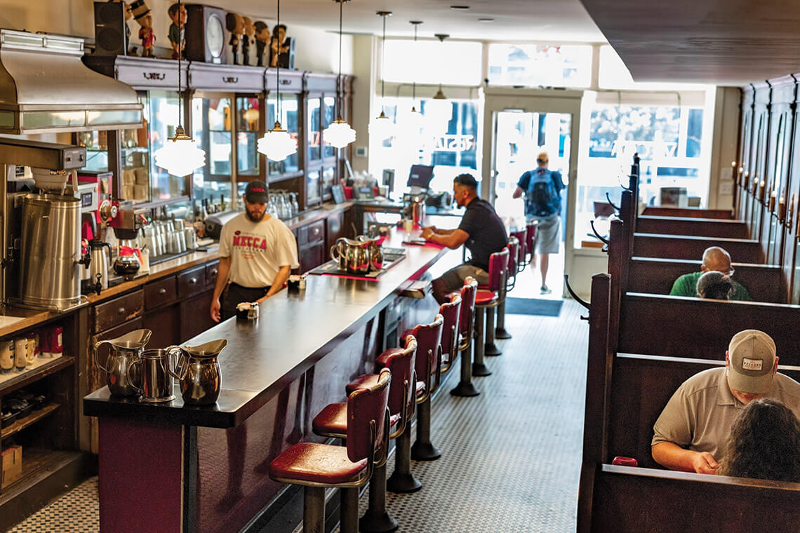 People dine in the Mecca