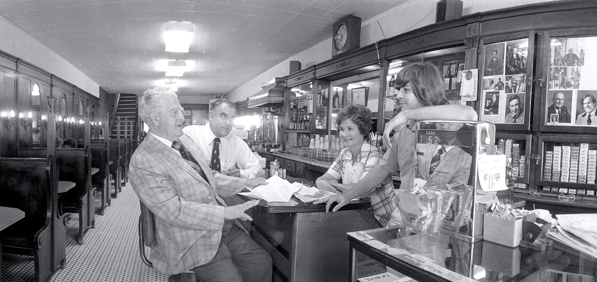Black and white photo of patrons at The Mecca in Raleigh