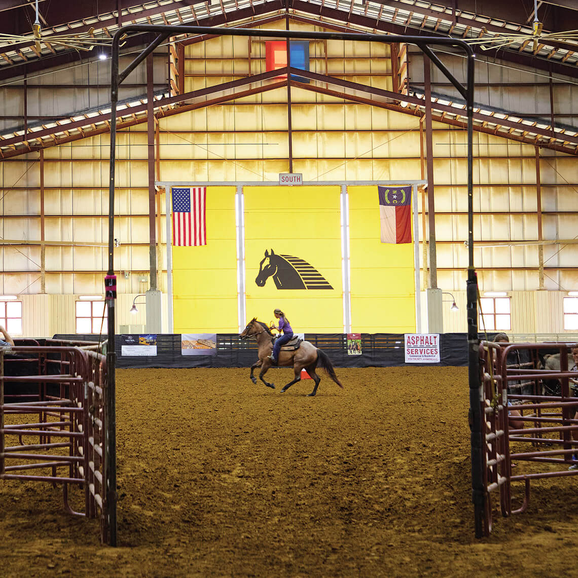 Young rider and her horse practice at the Senator Bob Martin Eastern Agricultural Center