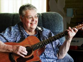 Rhonda Gouge plays the guitar