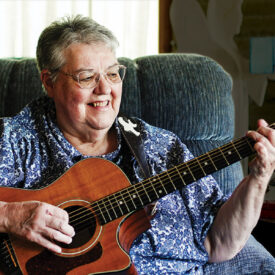 Rhonda Gouge plays the guitar