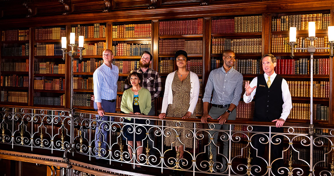 Tour goers visit the Library at Biltmore Estate