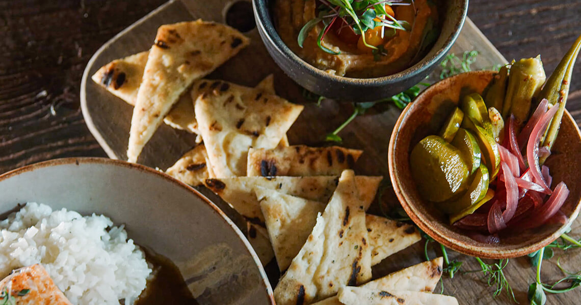 seasonal hummus and house pickle plate with grilled naan at Ashten's in Southern Pines
