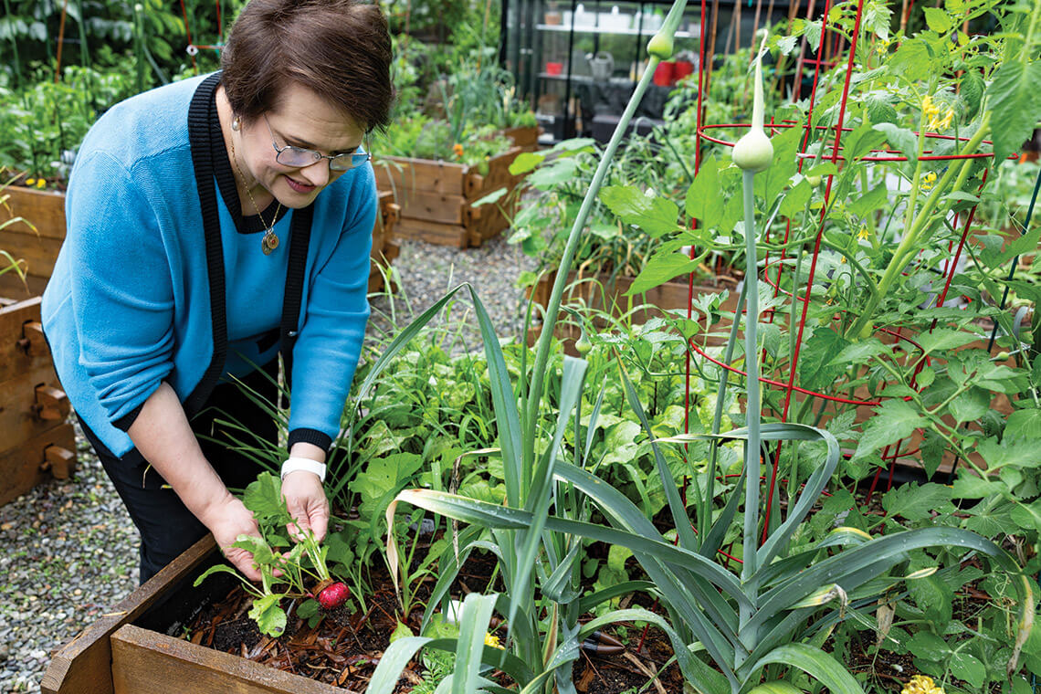 Sandra Gutierrez in her garden