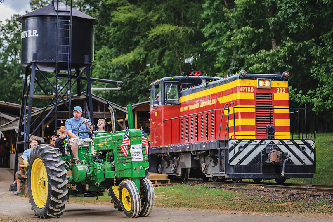 Train car and tractor at the Southeast Old Threshers Reunion at Denton FarmPark