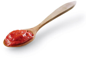 Spoon of tomato sauce