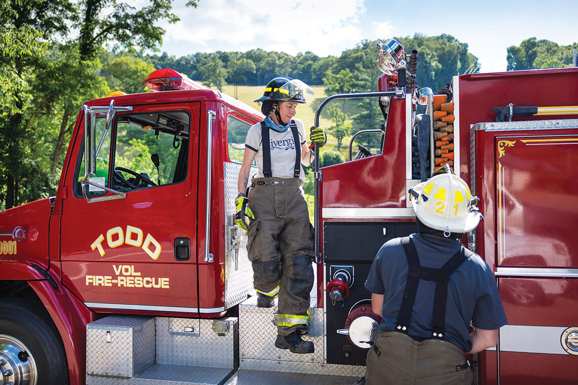 McCoy climbs off the Todd Volunteer Fire Truck
