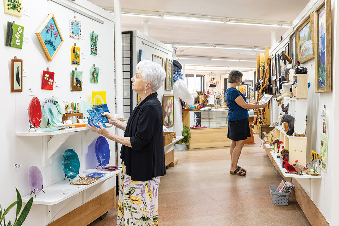 Shoppers inside The Arrowhead Gallery & Studio in Old Fort