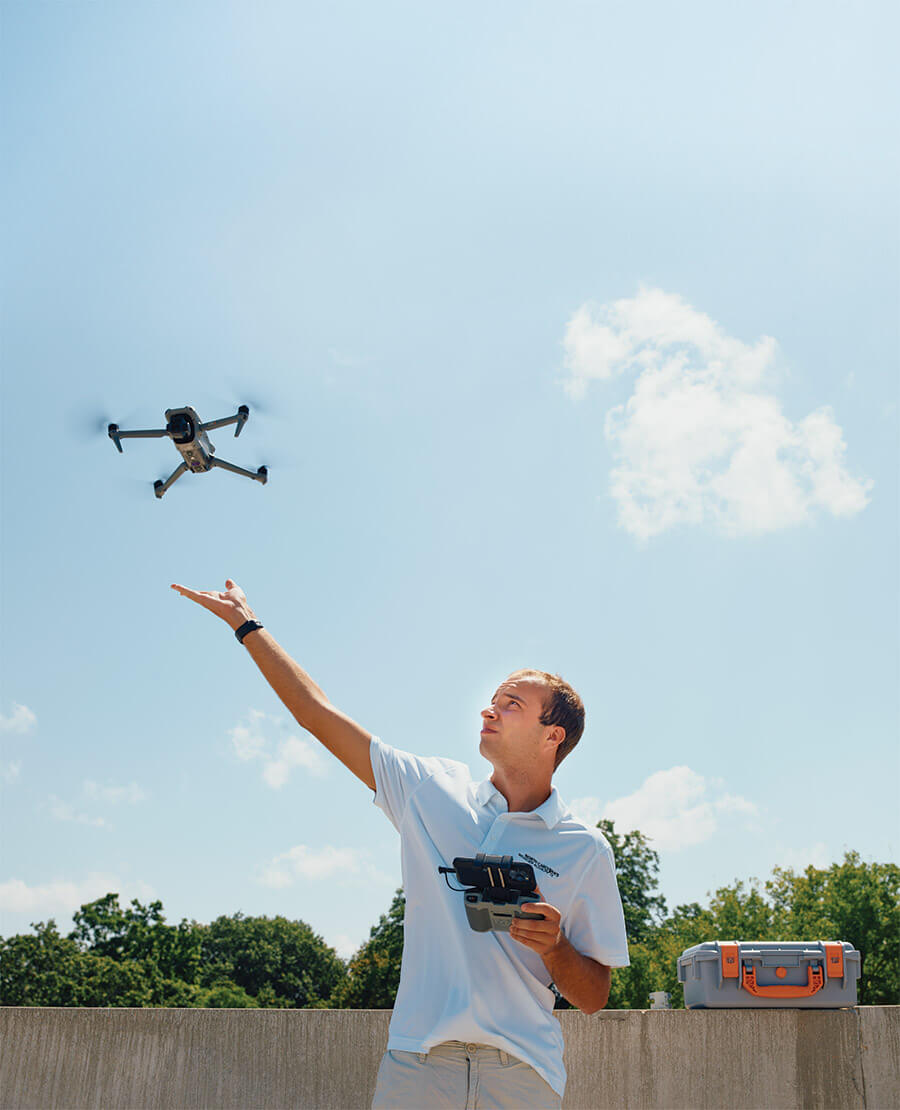 Ethan Clark releases a weather drone