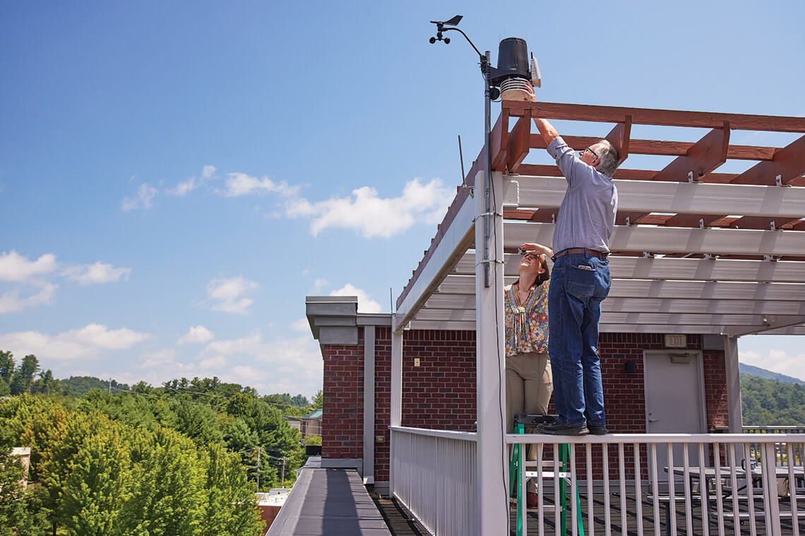 Ray Russell checking the weather station