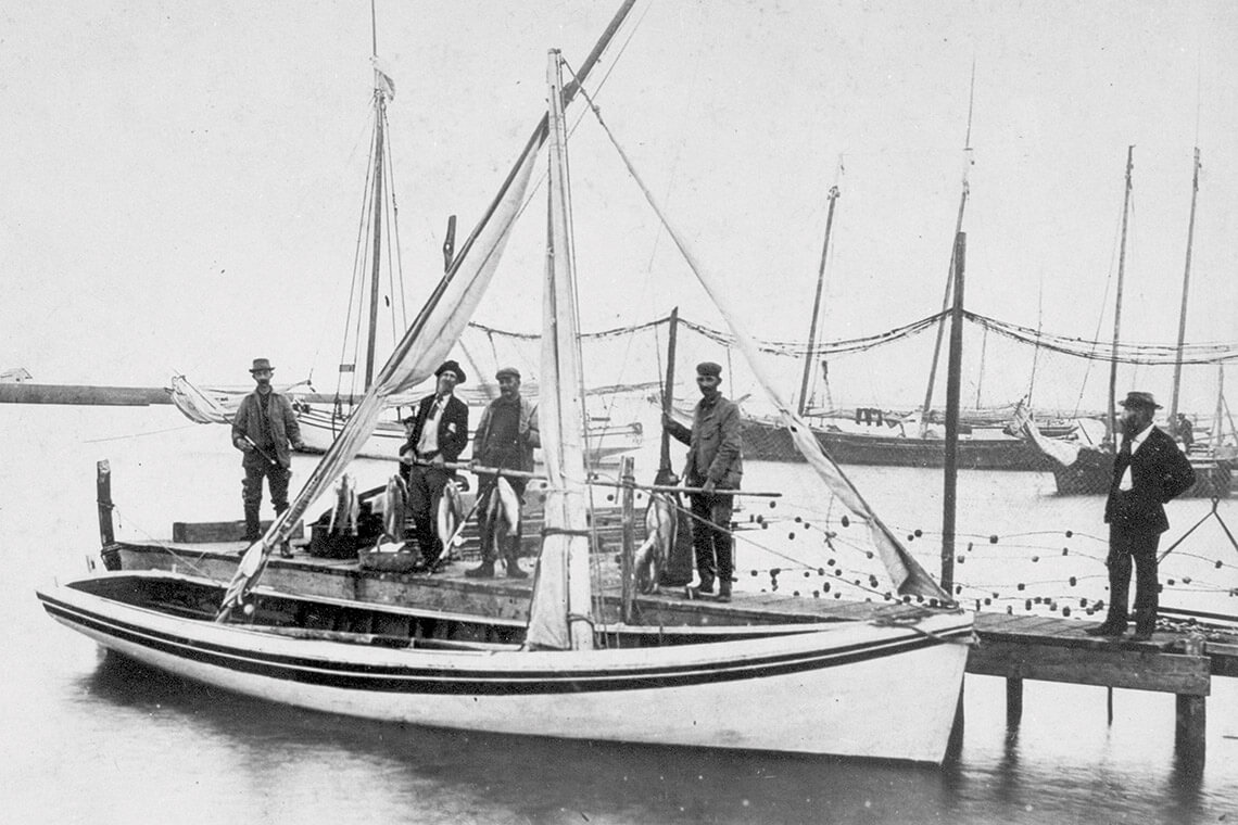 Black and white photo of a shad boat on Roanoke Island