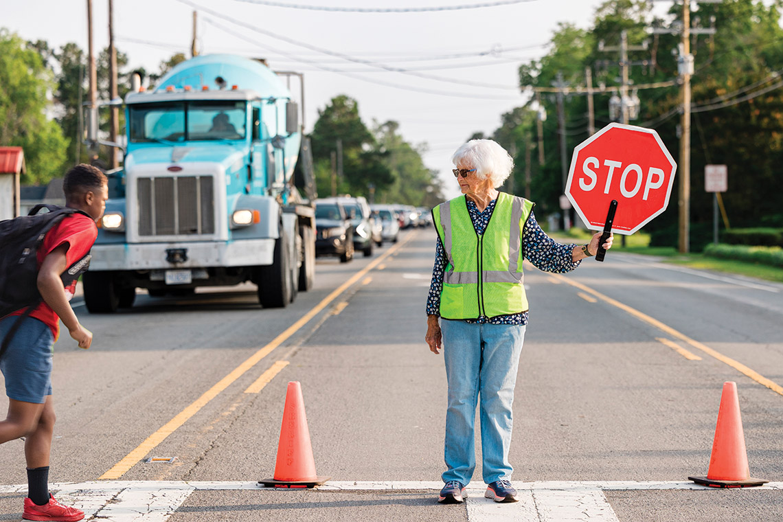 Vada Keller stops traffic as a school crossing guard