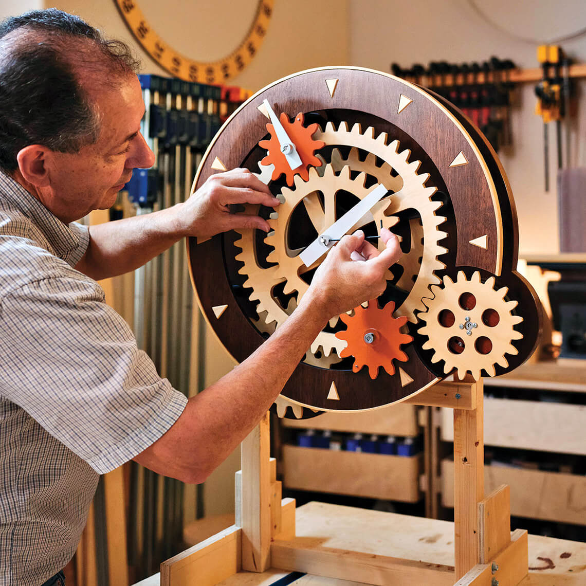 Joe Carr crafts a wooden clock