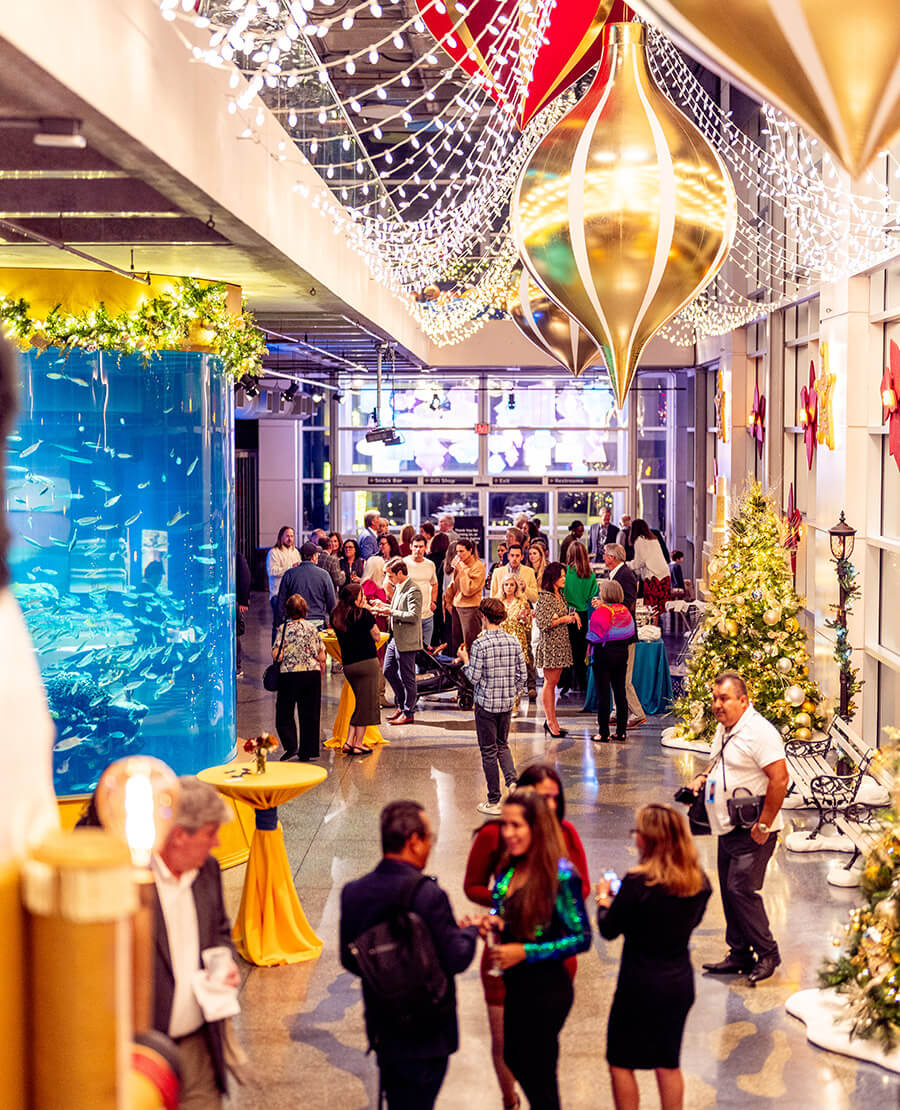 Visitors entering Aquarium Aglow at the South Carolina Aquarium