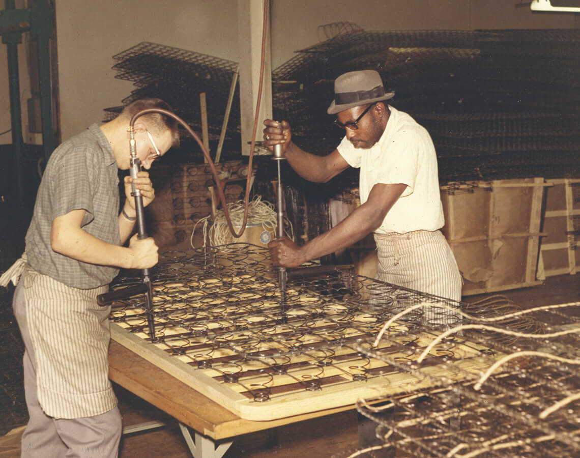 IFB employees assemble a mattress