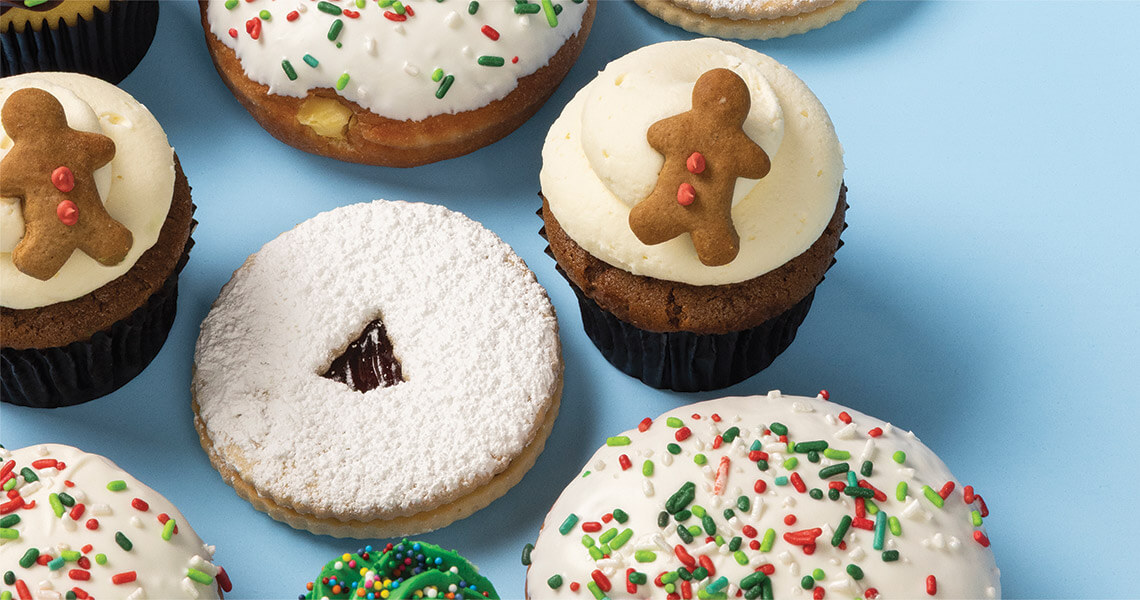 Spread of Christmas cookies and cupcakes