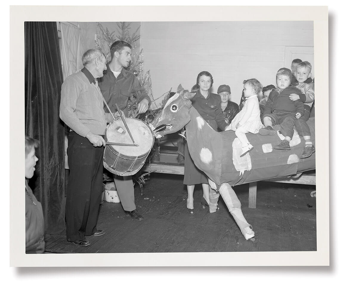 Black and white photo of Old Buck at Old Christmas celebration n 1953