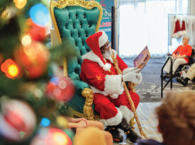 Hop the Black Santa reads to the attendees of the Advanced Santa Studies Course