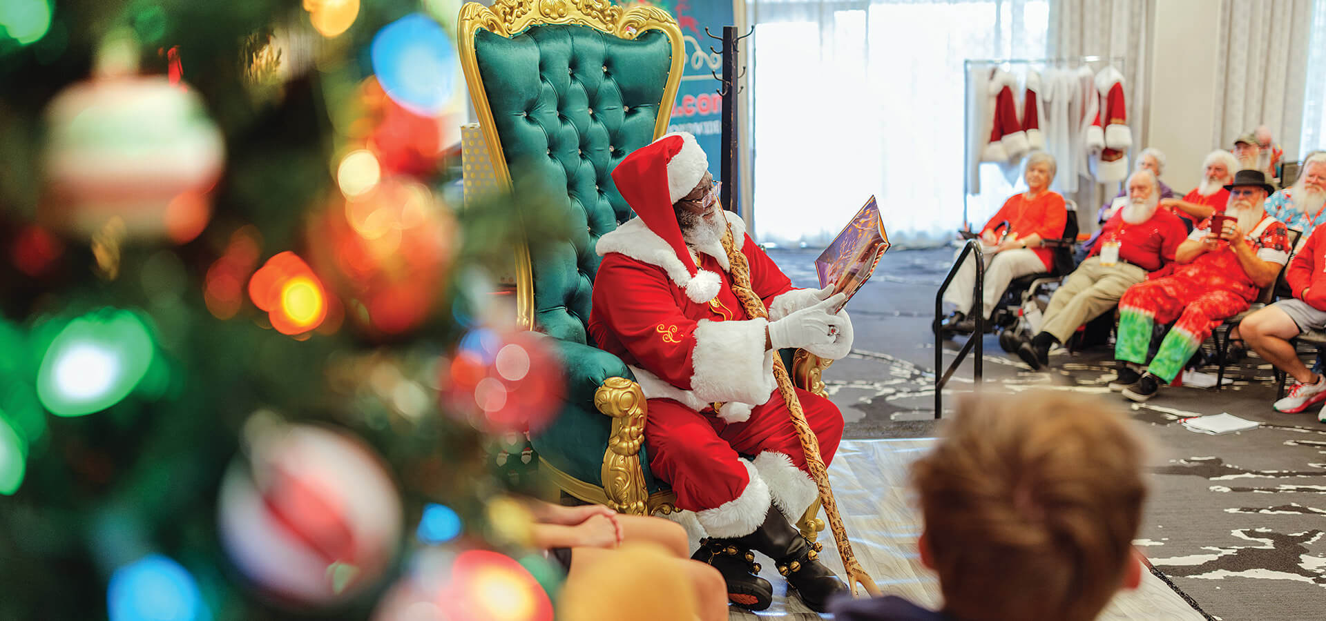 Hop the Black Santa reads to the attendees of the Advanced Santa Studies Course